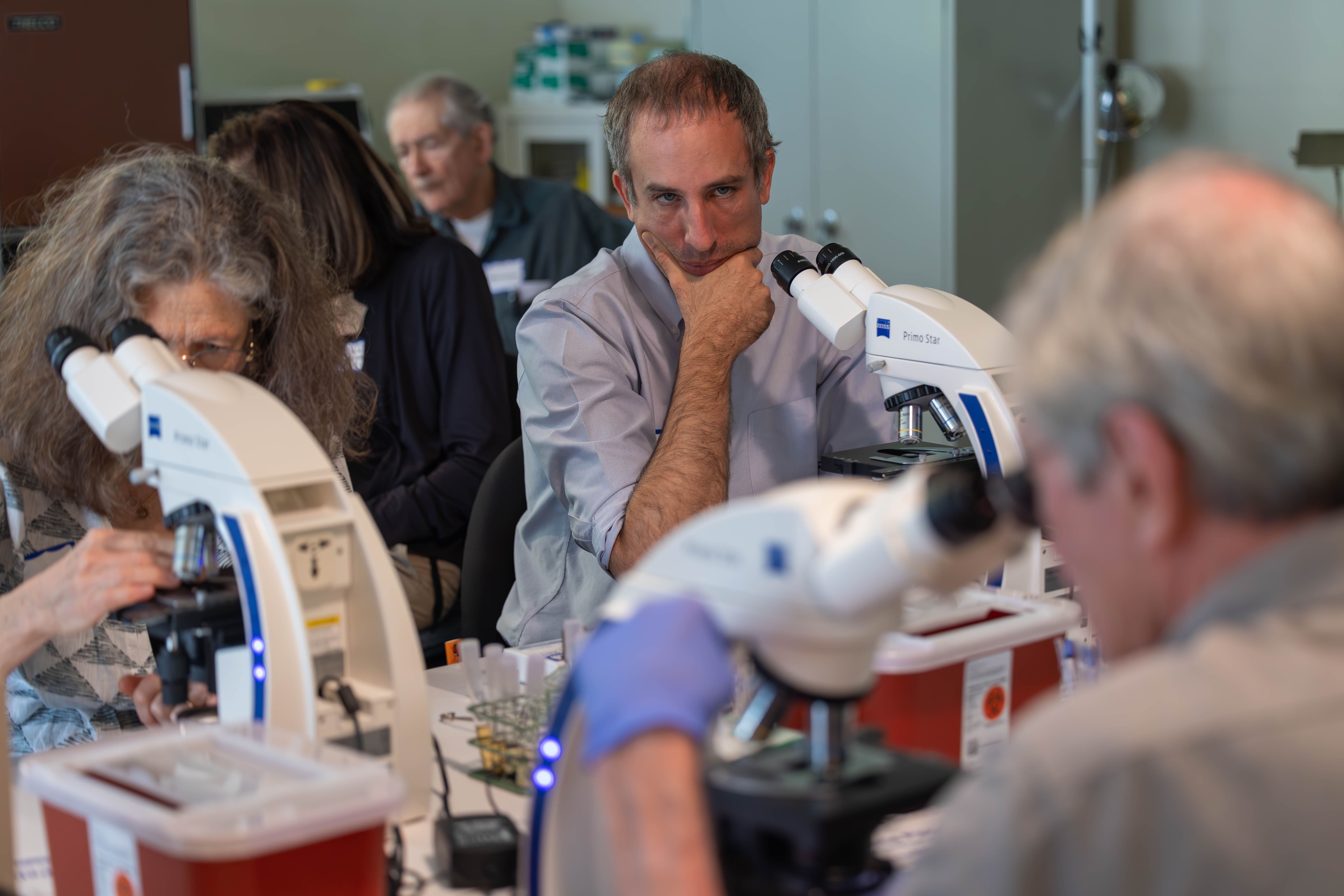 Students and Faculty working in lab.