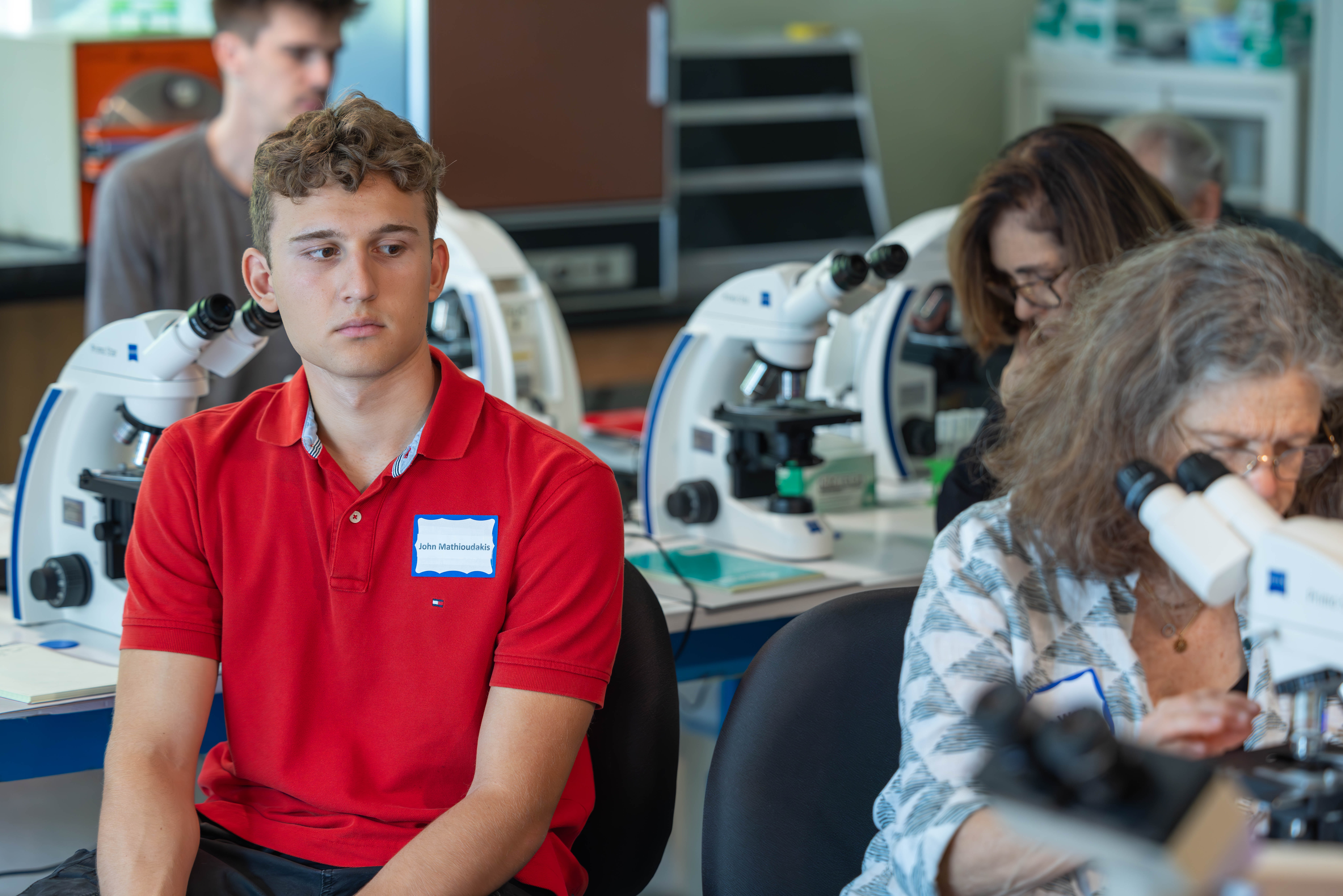 Students and Faculty working in lab.