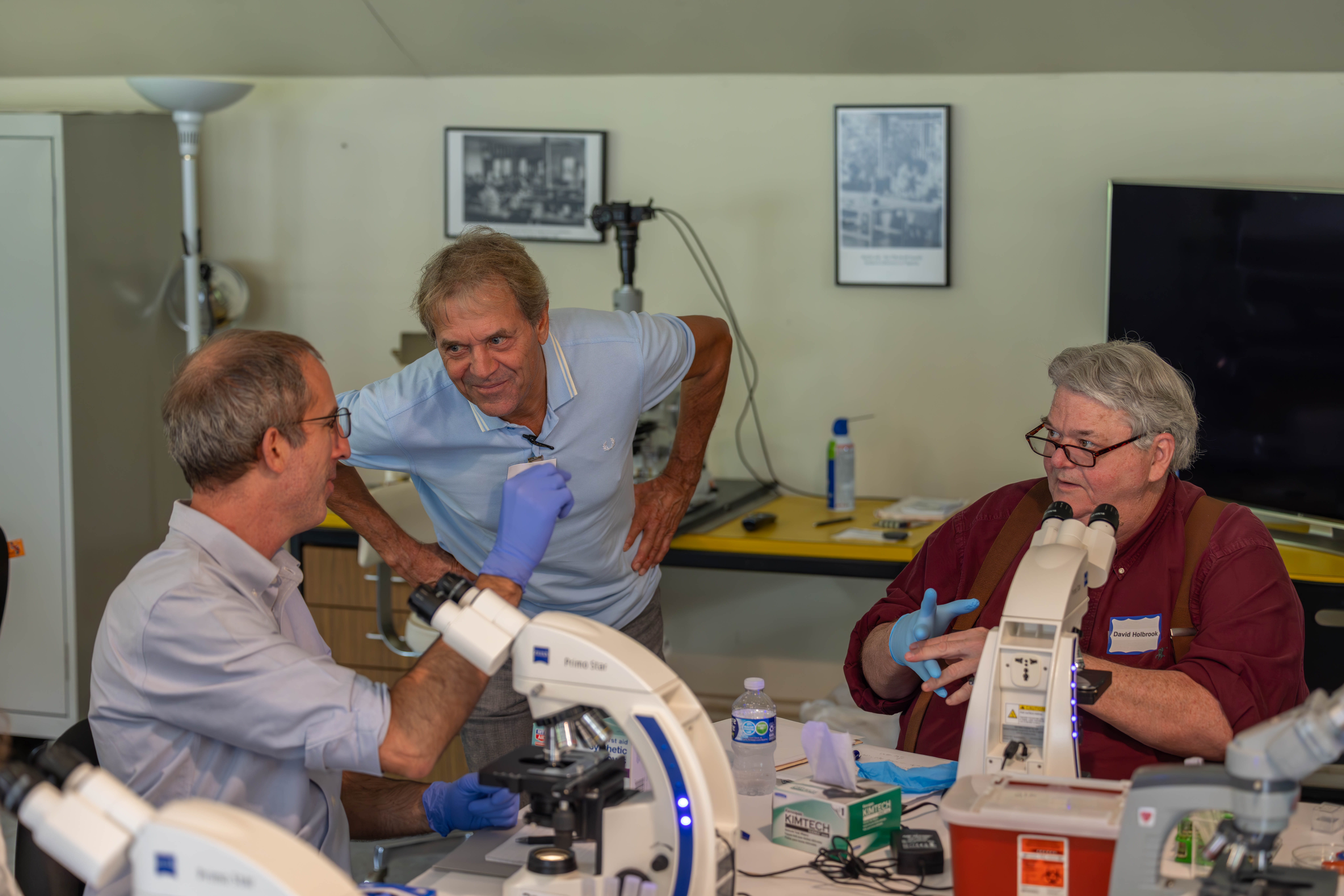 Students and Faculty working in lab.